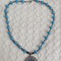 Large Faux Turquoise And Silver Tone Pendant Necklace