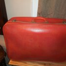 Retro orange medium size suitcase