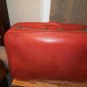 Retro orange medium size suitcase