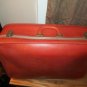 Retro orange medium size suitcase