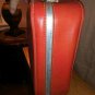 Retro orange medium size suitcase