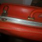 Retro orange medium size suitcase