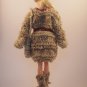 All hand knitted uniquely designed winter outfit (coat, hat, boots and purse) for Barbie