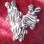 Cute handmade and uniquely designed stuffy bunny: zebra pattern, blue eyes and green nose