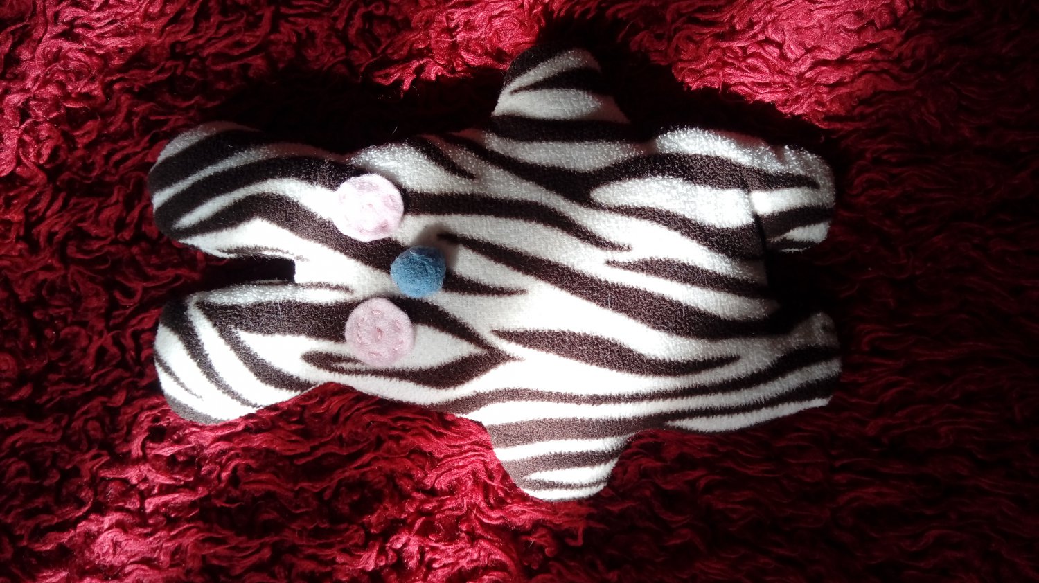 Zebra-pattern handmade and uniquely designed stuffy bunny: light pink eyes and light blue nose