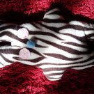 Zebra-pattern handmade and uniquely designed stuffy bunny: light pink eyes and light blue nose