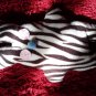 Zebra-pattern handmade and uniquely designed stuffy bunny: light pink eyes and light blue nose