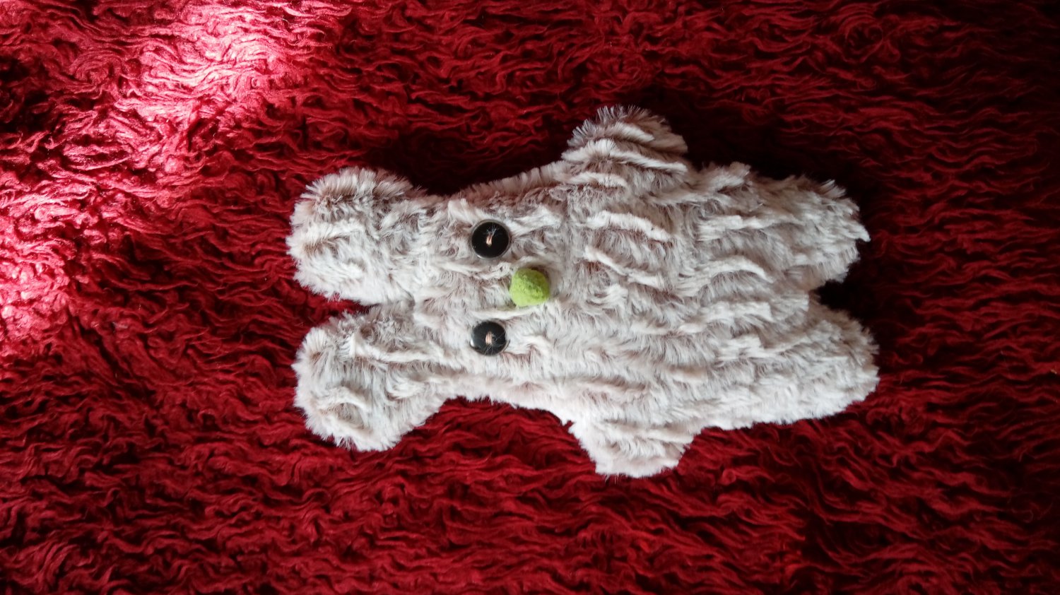 Soft neutral cream color and uniquely designed stuffy bunny: green nose