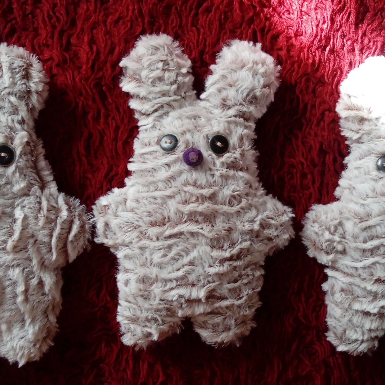 Soft neutral cream color and uniquely designed stuffy bunny: purple nose