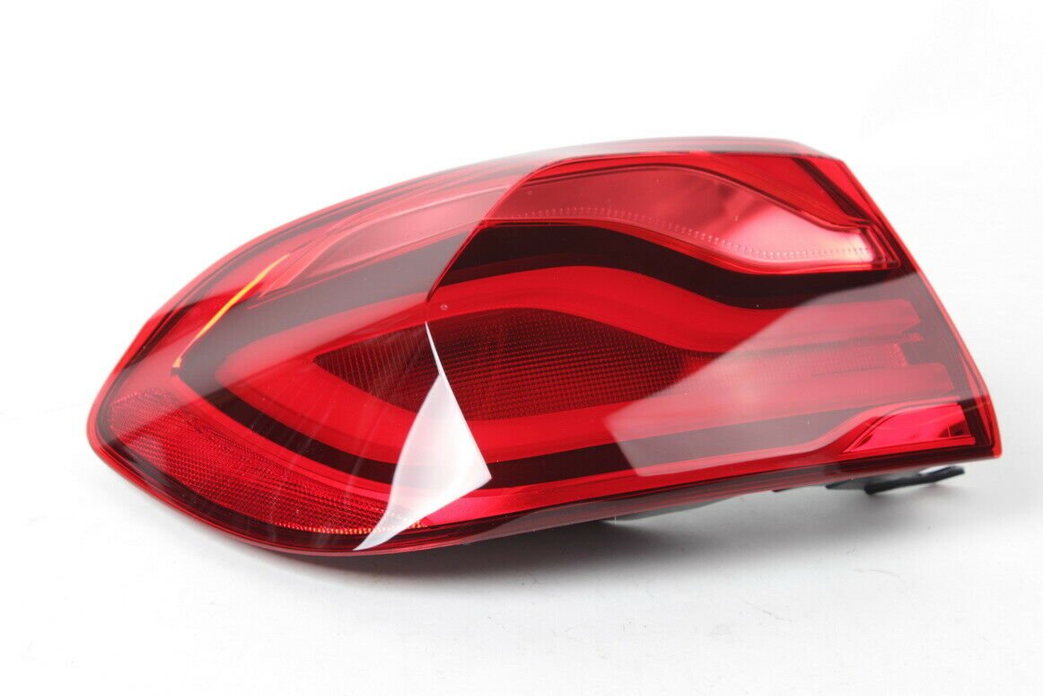 BMW 63218496523 Rear light in the side panel, left (OE GENUINE)