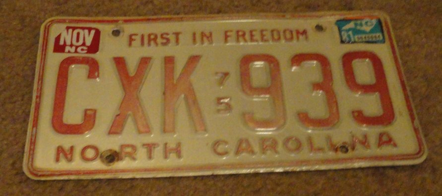 1975 CXK 939 North Carolina license plate with 1981 and November sticker