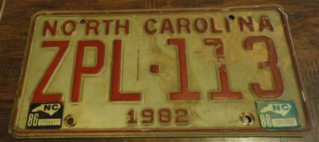1982 ZPL 113 North Carolina license plate with 1986 and 1988 stickers