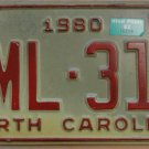 1980 North Carolina license plate TML 312 with June 1984 stickers