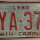 1980 North Carolina license plate TYA 372 with February 1985 stickers