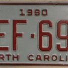 1980 North Carolina license plate WEF 698 with May 1985 stickers