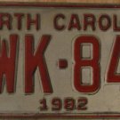 1982 North Carolina license plate YWK 841 with February 1990 stickers