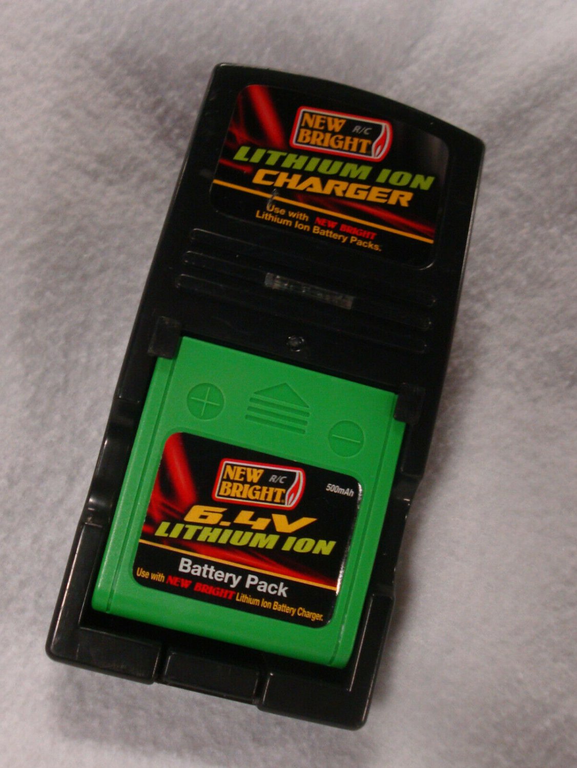 New Bright A587500493 6.4/9.6v Volt Lithium Ion Battery Charger + 6.4v Battery