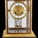 Decor Art. USA Caldwell Bronze Mantle clock with a mercury pendulum.