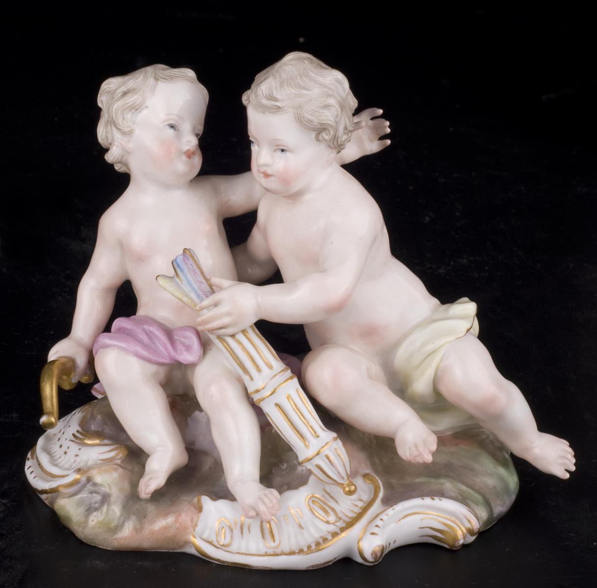 Decor Art. Germany. Meissen Sculpture. Two putti with bows and arrows.