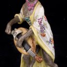 Decor Art. Germany. Meissen Figurine. Hurdy-gurdy woman.