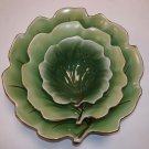 Set of three deep vintage ceramic leaf-shaped plates