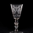 Cup with ornamental ""carpet"" decor.