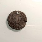 A birth amulet. XVIII century. Bronze, weight: 5.8 grams, diameter 2.5 cm