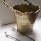Antique brass bucket for chilling champagne or wines, with ice collector and ice tongs. Antique brass bucket for chilling champagne or wines, with ice collector and ice tongs.