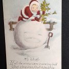 Christmas 1920 Child Making Snowball Snowman? Antique Postcard 1c stamp