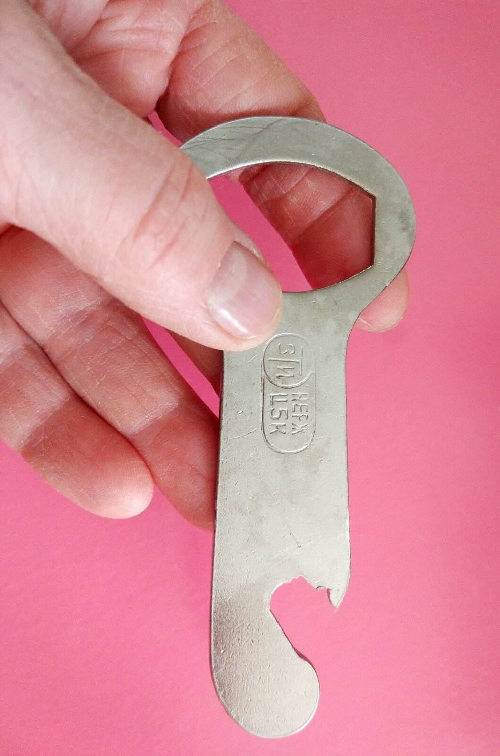 Old bottle opener USSR stainless steel