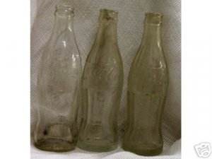 8- 6 oz. glass coke bottles (glass weight 14.2oz)