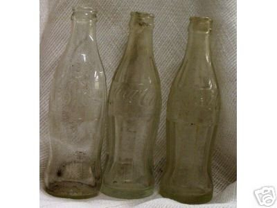 4- 6 ounce glass coke bottles (glass weight 8.2oz)