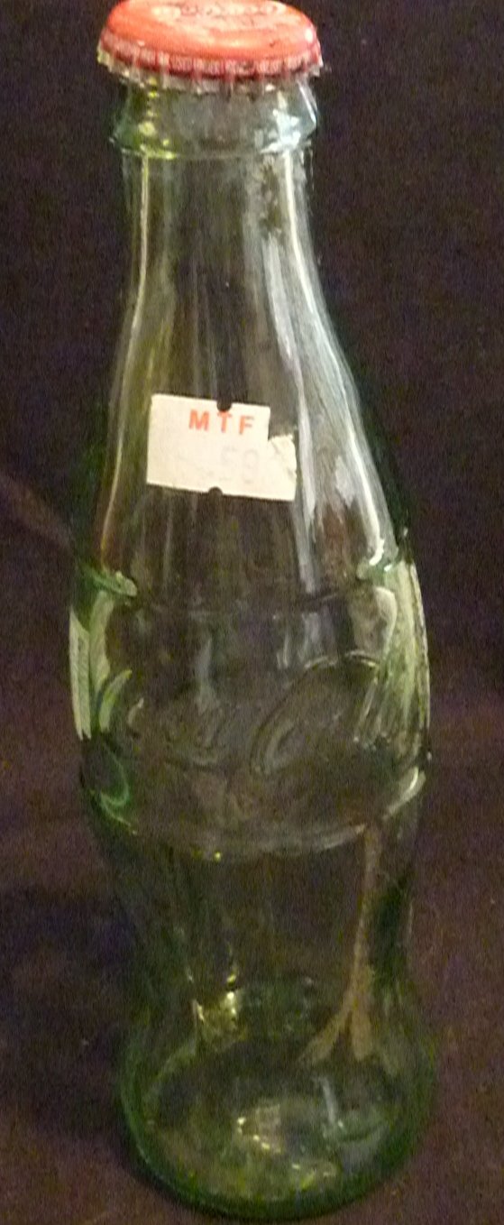 Coke bottle (1915-1956) green embossed with white code on side