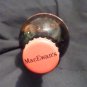 uncle ben's malt liquor glass with top that is used for stand