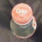 2 Different Coca Cola Bottles 750ml