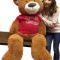 5 Foot Giant Brown Teddy Bear Wears Red Tshirt that says Merry Christmas