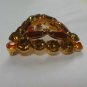 Triangular Shape Brooch with multi color faceted prong-set stones