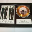 take that  signed disc