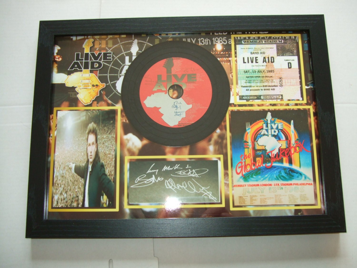 u2 live aid  signed disc