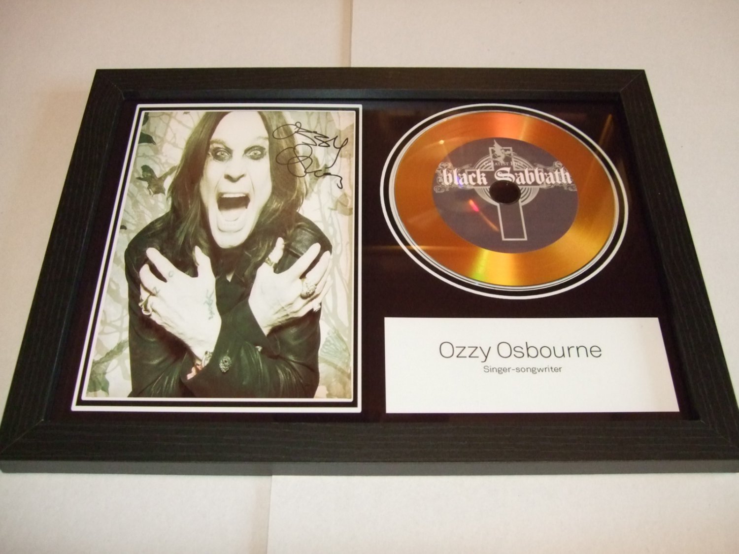 ozzy    signed disc