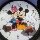 MINNIE & MICKEY CAMPFIRE WALL CLOCK 9"RV-