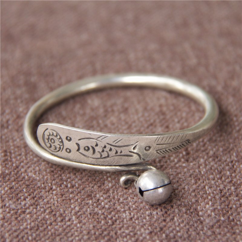 Fish erie bracelet jewelry with bell charm on end, silver torc bangle viking bracelet in metal