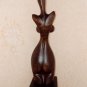 Woman' torso. Wood sculpture, signed.