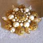 White Stone Gold Tone Filigree Brooch
