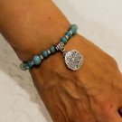 Turquoise Howlite Bead Bracelet with Sand Dollar charm