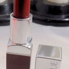 Clinique Pop Lipstick.  Color is Cola Pop 03