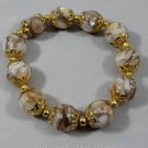 Mother of Pearl Bead bracelet with gold plated beads and accents.