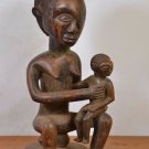 African Tribal art,maternity luba statue setting on stool from Katanga ( DRC).