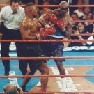 MIKE TYSON vs EVANDER HOLYFIELD 8X10 PHOTO BOXING PICTURE EXCHANGE PUNCHES MIKE TYSON vs EVANDER HOLYFIELD 8X10 PHOTO BOXING PICTURE EXCHANGE PUNCHES