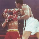 MUHAMMAD ALI HITS LEON SPINKS 8X10 PHOTO BOXING PICTURE MUHAMMAD ALI HITS LEON SPINKS 8X10 PHOTO BOXING PICTURE
